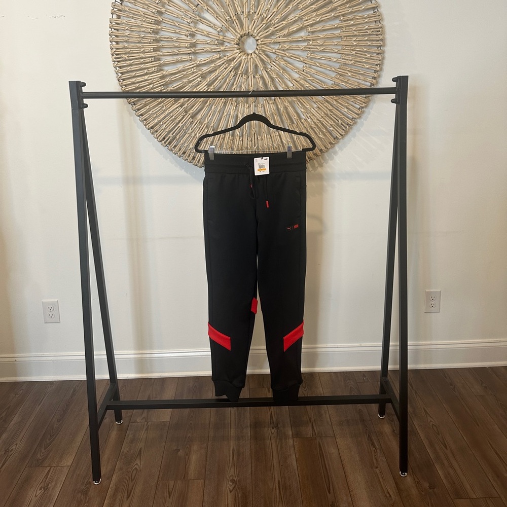 BLACK AND RED PUMA SWEAT PANTS